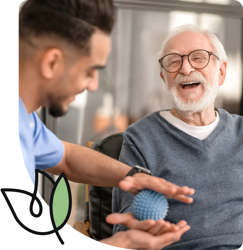 Senior exercising with caregiver